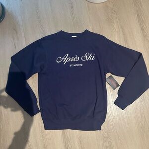 Après Ski St. Moritz sweatshirt from Revolve